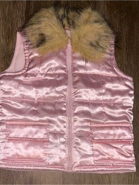 Pink silk puffer vest with faux fur collar